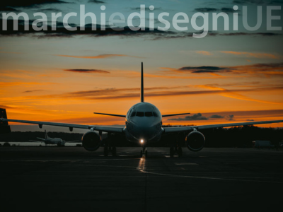 Il caso ITA Airways vs. Aeroitalia - immagine di copertina con aereo al tramonto